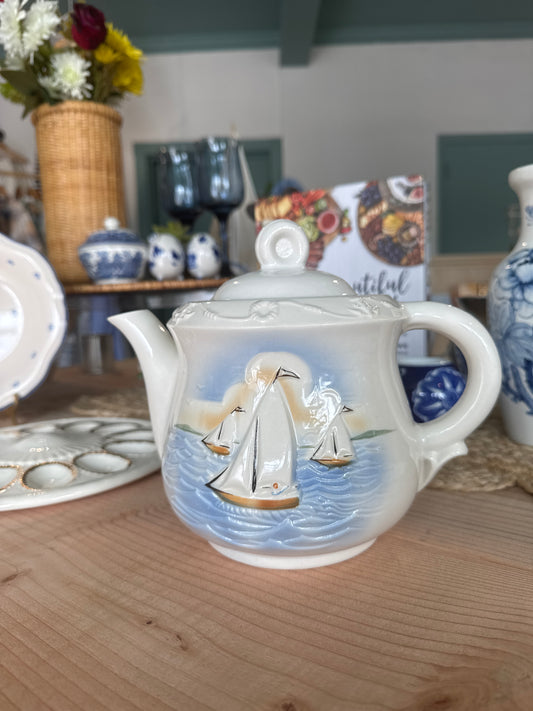 Vintage teapot with sail boats