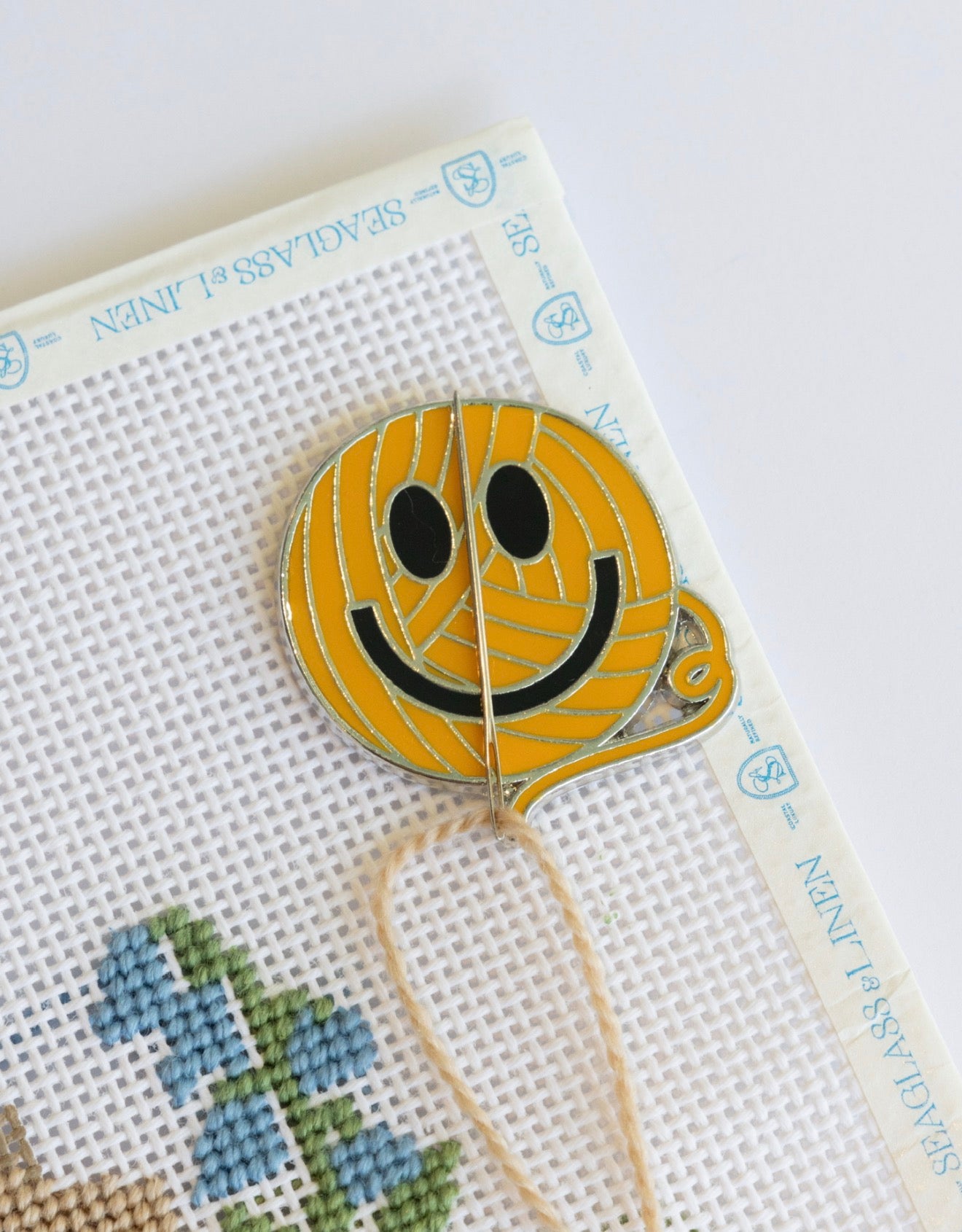 Smiley face Needle minder