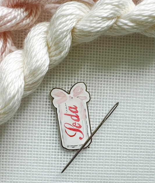 diet soda with bow needle minder