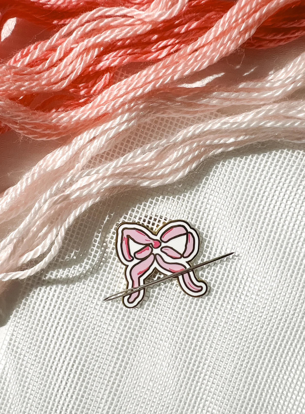 Bow needle minder
