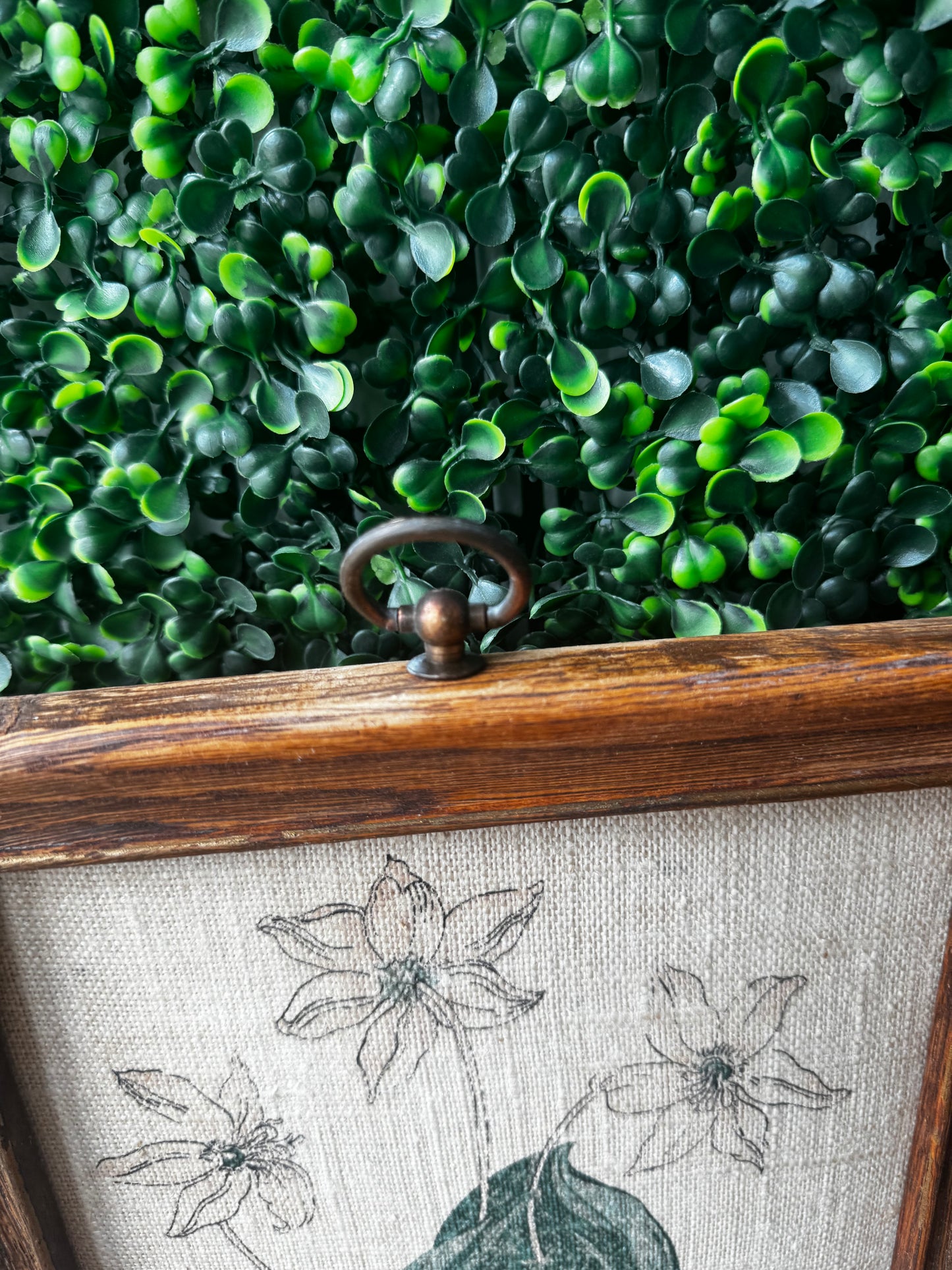 Vintage linen print in wood frame